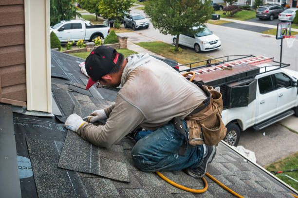 Professional Hail Damage Roof Repair technician working in Orting, WA